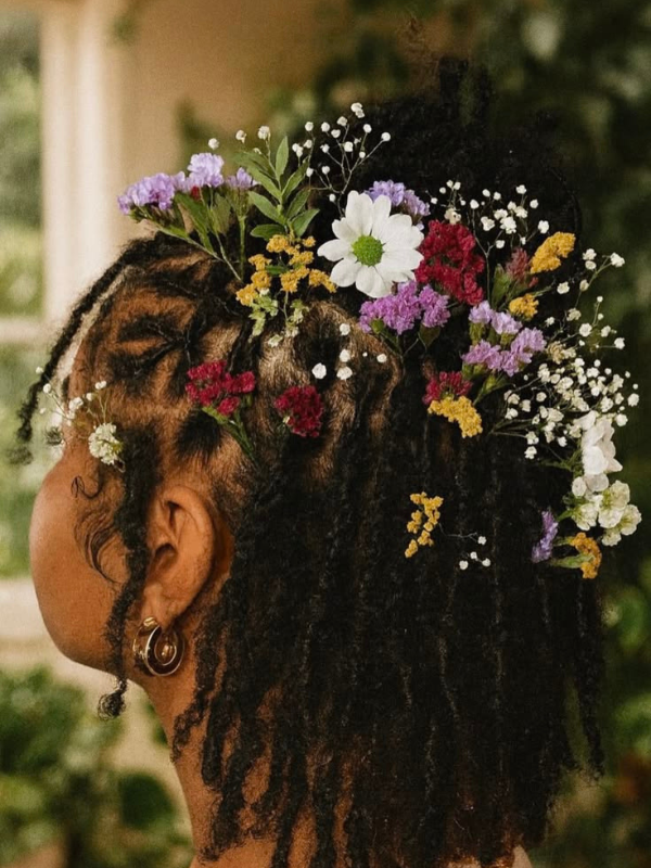 Locs- With-Bridal-Flowers-Wedding-Loc-Hairstyles-for-Brides